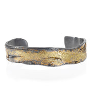 Todd Reed cuff bracelet made with 18k yellow gold and sterling silver with patina